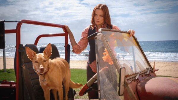 Return to Paradise - Anna Samson as McKenzie Clark with a canine friend