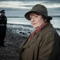 Brenda Blethyn as Vera, in trademark hat and trenchcoat