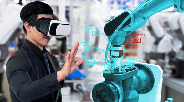 Man wearing virtual reality headset standing in front of manufacturing product