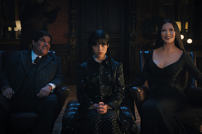 Wednesday Addams and her proud parents Gomez and Morticia