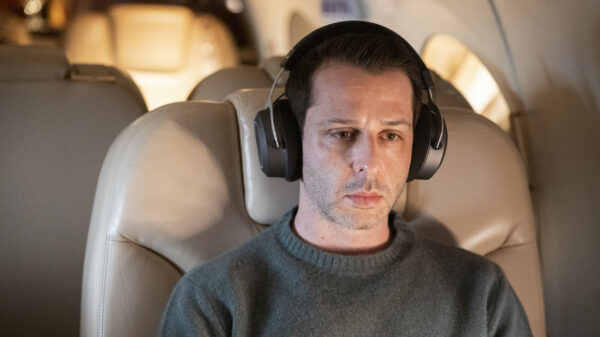 Succession's Kendall Roy (Jeremy Strong) wearing headphones