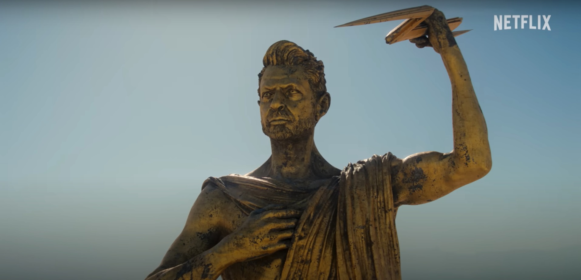 KAOS - statue of Jeff Goldblum as Zeus