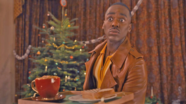 Doctor Who Christmas 2024 - The 15th Doctor (Ncuti Gatwa) bearing a ham and cheese toastie, and a pumpkin spiced latte