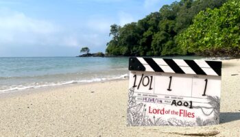 The Lord of the Flies clapperboard on an tropical beach.