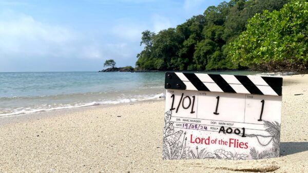 The Lord of the Flies clapperboard on an tropical beach.