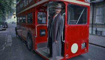 Bookish - Mark Gatiss as Gabriel Book, on the back of a London routemaster bus
