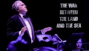 Lorne Balfe - composer of the Doctor Who spinoff 'The War Between the Land and the Sea' conducting an orchestra
