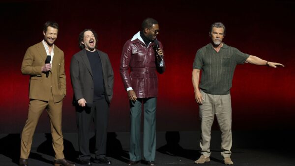 Director Edgar Wright stands on stage with his cast