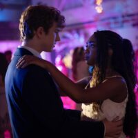 Percy Jackson and his love interest dance together at a prom in Season 3