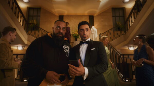 Bait First look image with Guz Khan on the left in a casual outfit and Riz Ahmed on the right in a tuxedo