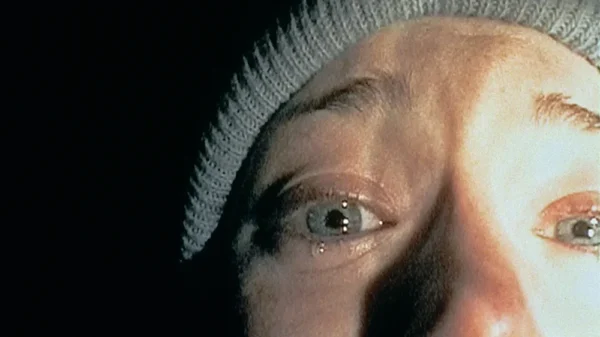 The iconic closeup of a scared cameraperson crying in fear from the original Blair Witch Project, which is getting a reboot with a new crew announced
