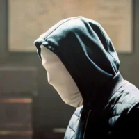 A masked character from The Day